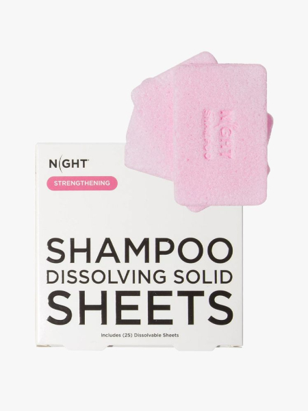 Night Shampoo Sheets in branded component on a light gray background
