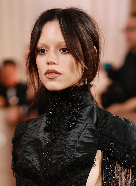 Jenna Ortega wearing a sparkling black dress at the Golden Globes
