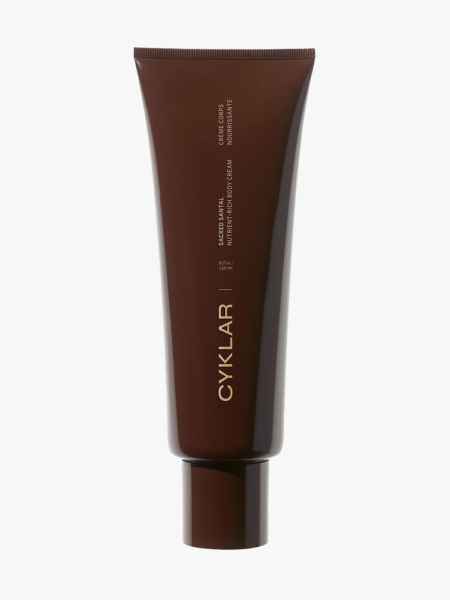 Cyklar Nutrient-Rich Body Cream in Sacred Santal in branded tube component on a light gray background