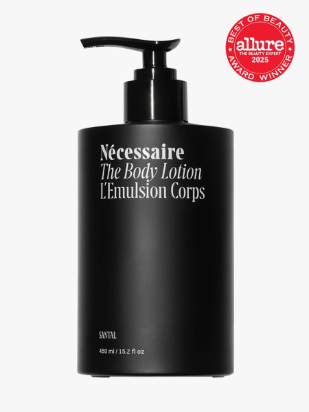 Nécessaire The Body Lotion in branded black bottle with pump on light gray background with red Allure Best of Beauty seal in the top right corner